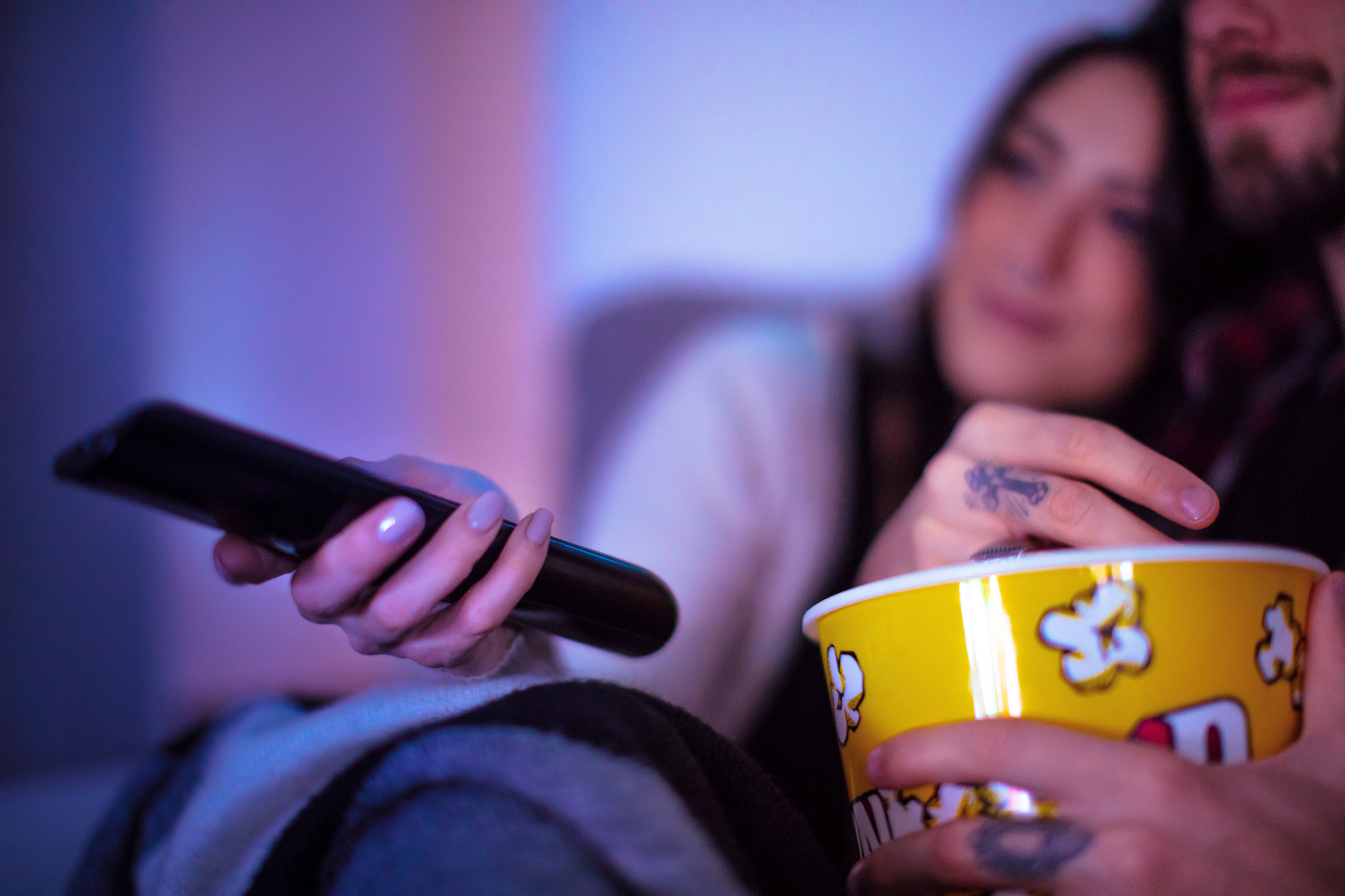 Couple Watching Movie During Lockdown Quarantine For Coronavirus